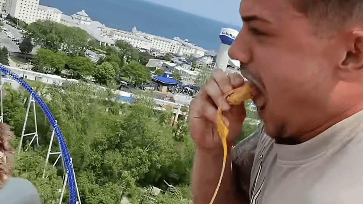 YouTuber banned from theme parks across America after eating chicken nuggets on ride
