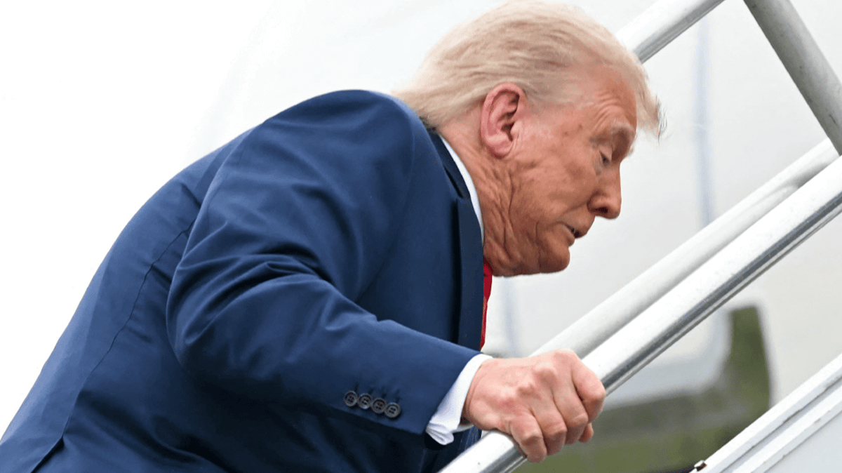 Footage of Trump tripping up Air Force One stairs labeled 'karma' as ...