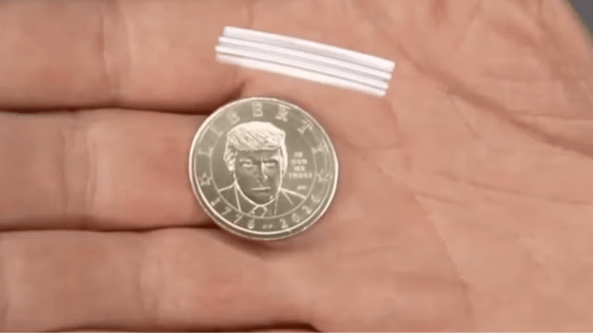 Trump might've just broken the law as people spot issue on $1 coin with his face on