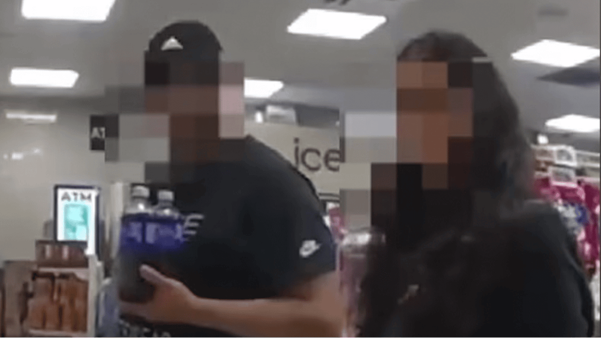 Woman rescued from suspected domestic abuse using hand signal that ...