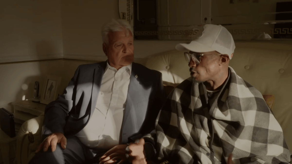 Moment man realised he is handcuffed to ex-Reform MP candidate who made awful racist comments