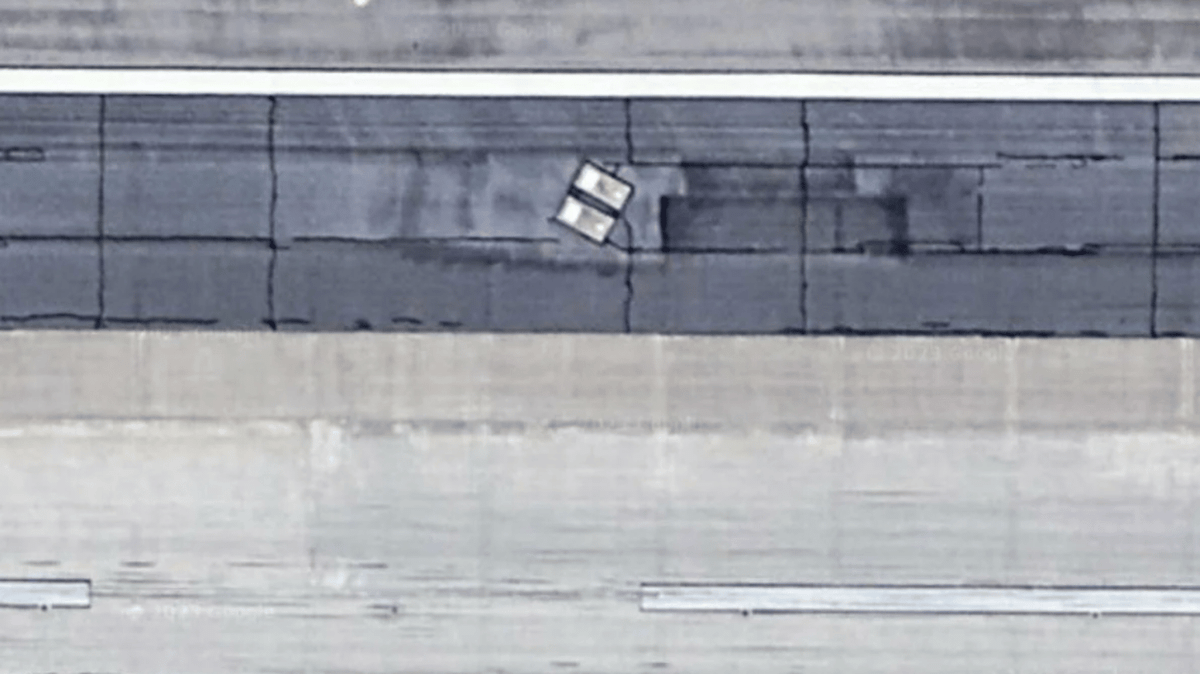Google Maps shows two people buried in graves under airport runway as ...