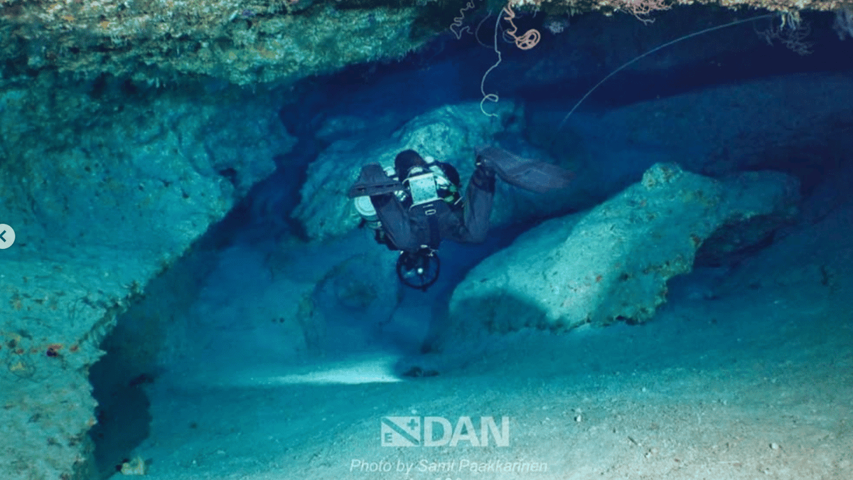 First pictures revealed of inside 'shark cave' where five divers tragically drowned - LADbible