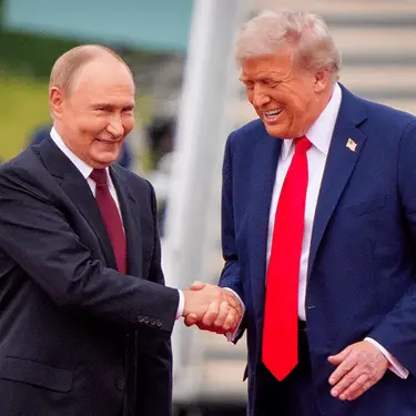 Trump pictured with Putin (Andrew Harnik / Staff via Getty)