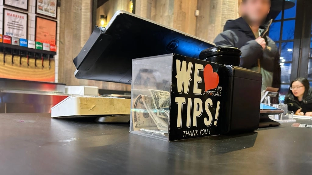 Waiter in "disbelief" after customer leaves $18,200 tip