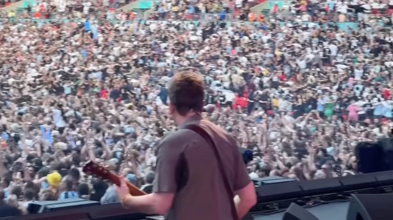 Witness describes moment Oasis fan fell during reunion concert as Liam and Noel Gallagher issue statement on his death