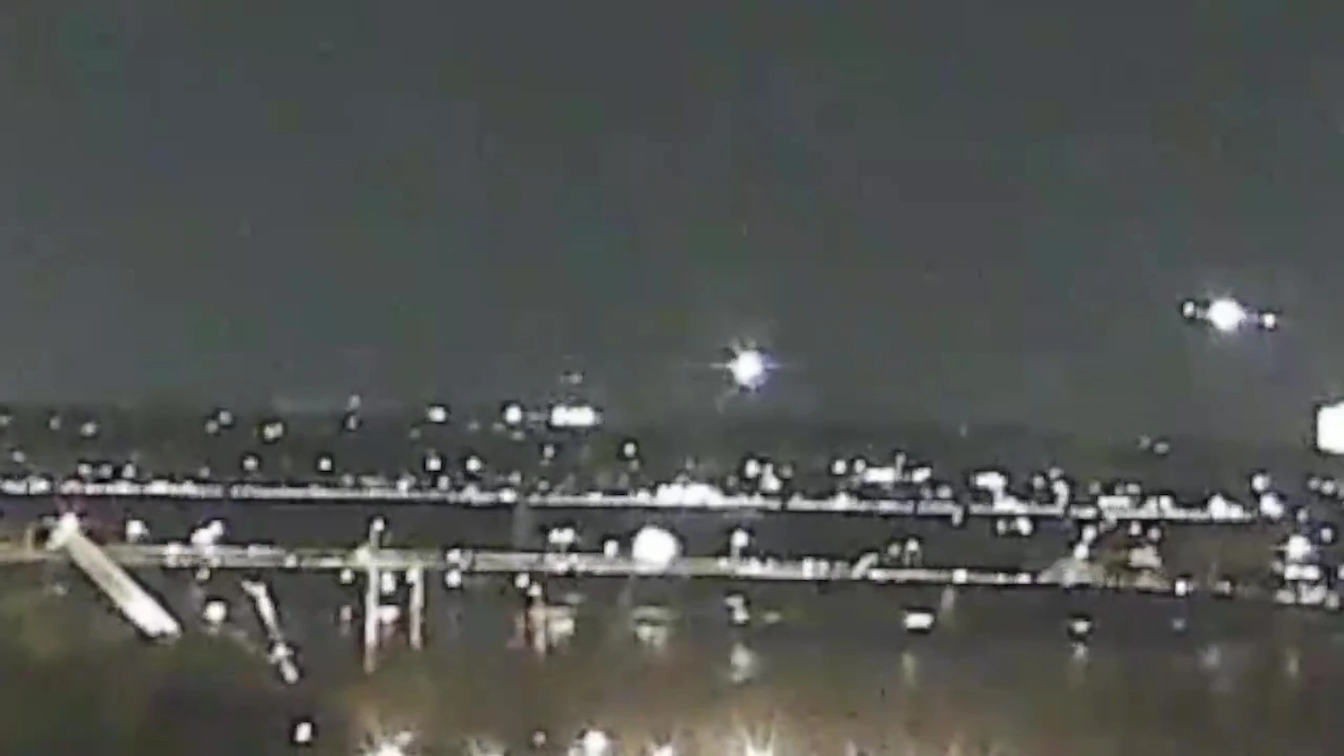 Officials 'don't know if there are survivors' as American Airlines flight crashes into helicopter and 'splits in half' mid-air