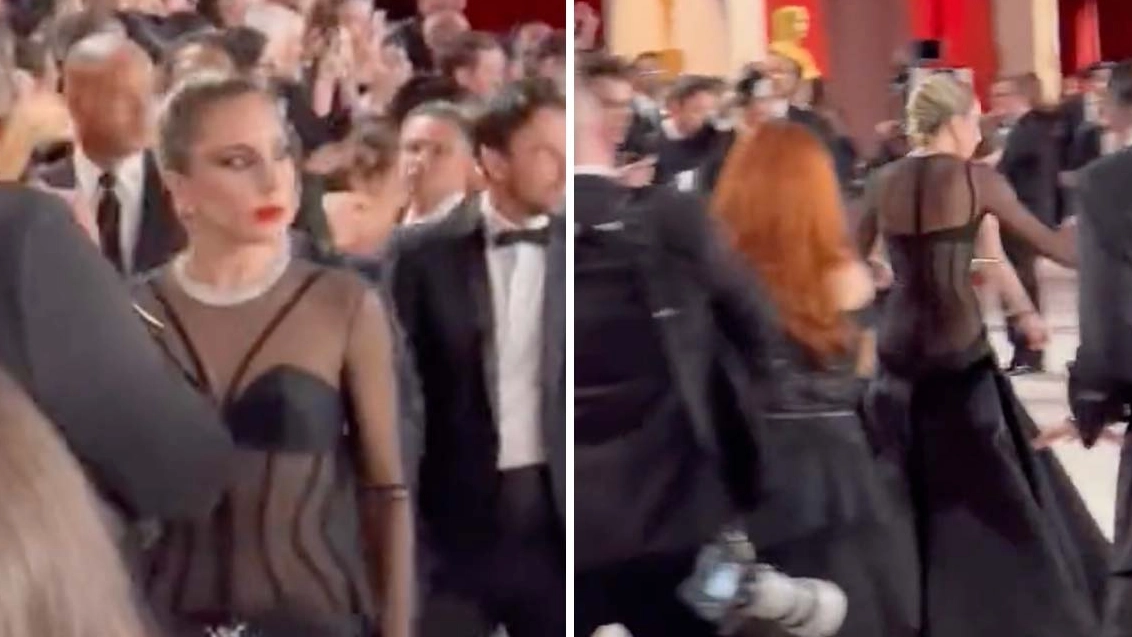 Lady Gaga runs to pick up paparazzi after he trips and falls on Oscars carpet