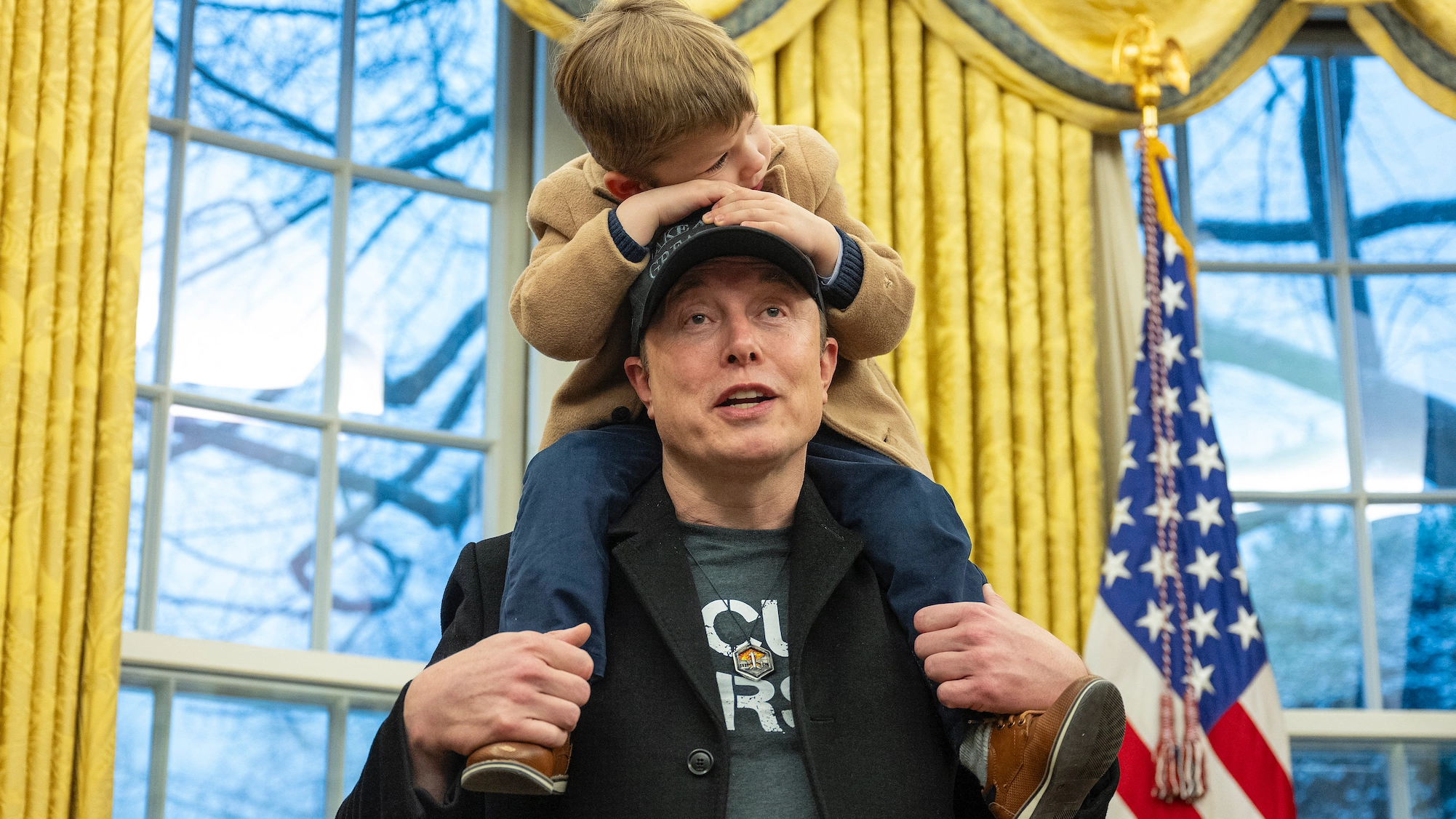 Elon Musk denies 'hostile takeover' of US government in first White House appearance with son