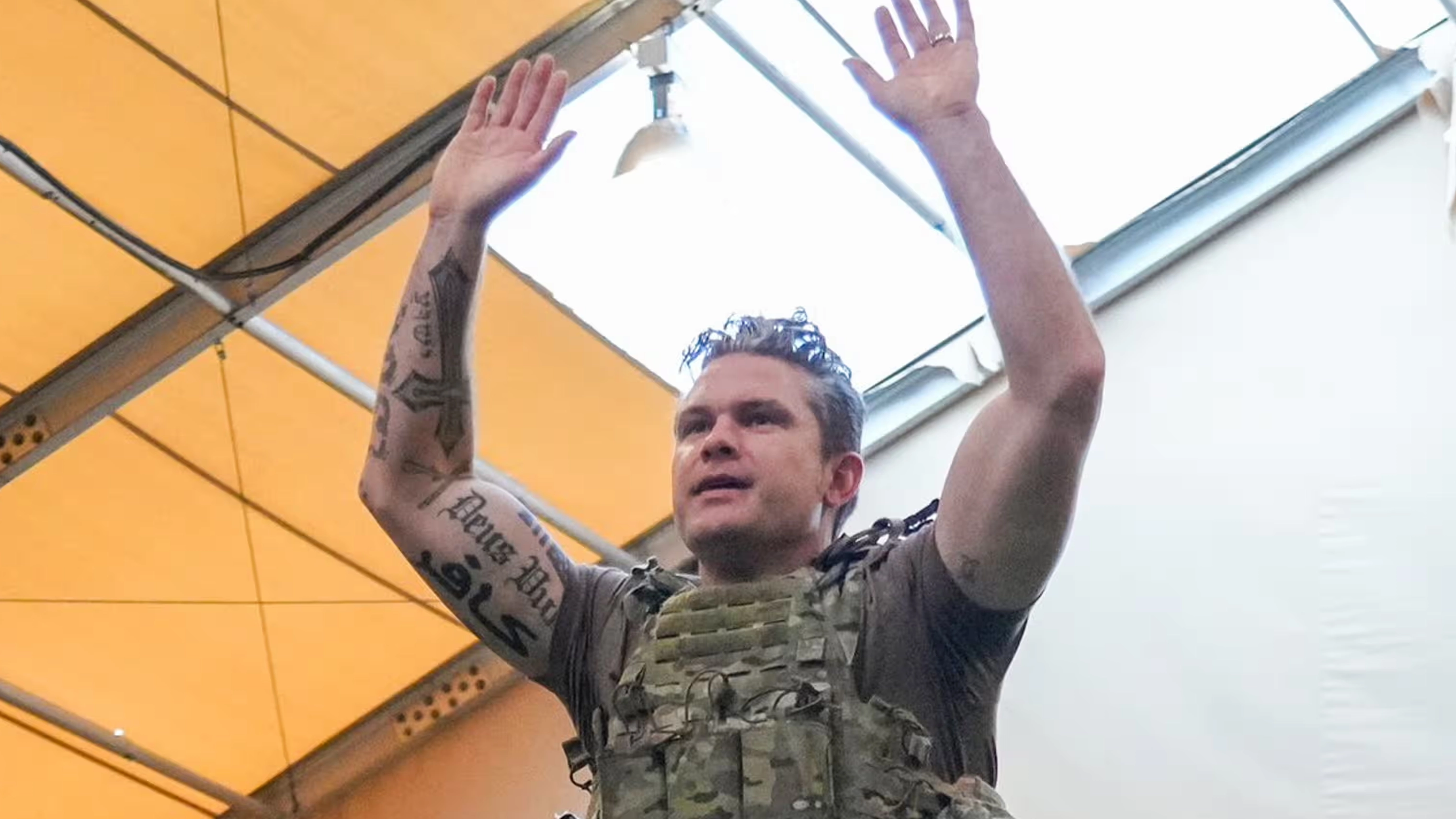 US Defence Secretary Pete Hegseth accidentally exposes controversial tattoo
