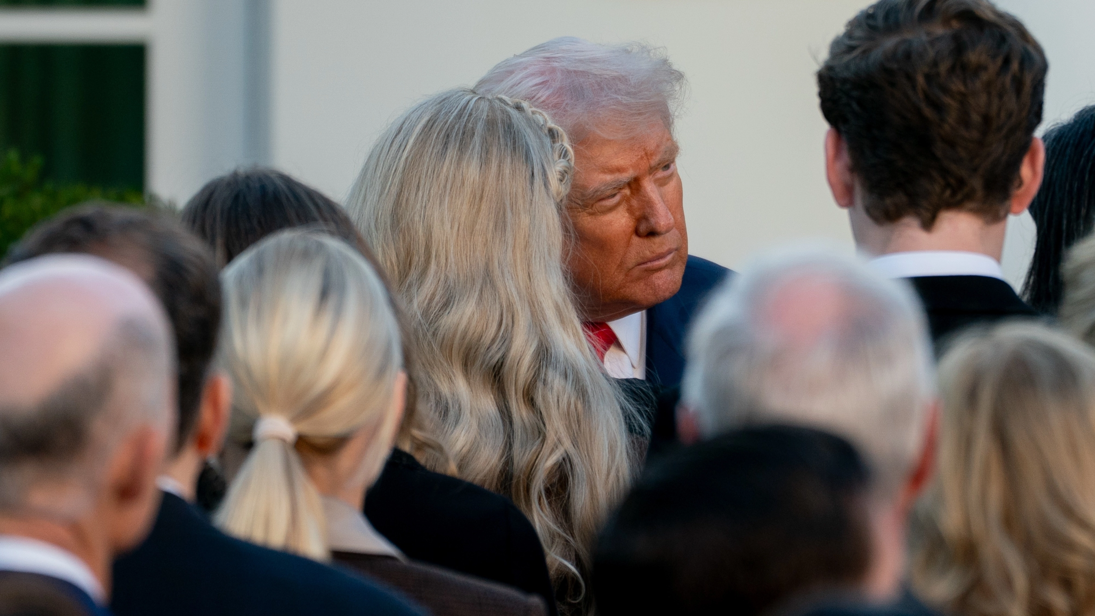Donald Trump speaks with Charlie Kirk’s parents as he awards their son with posthumous award