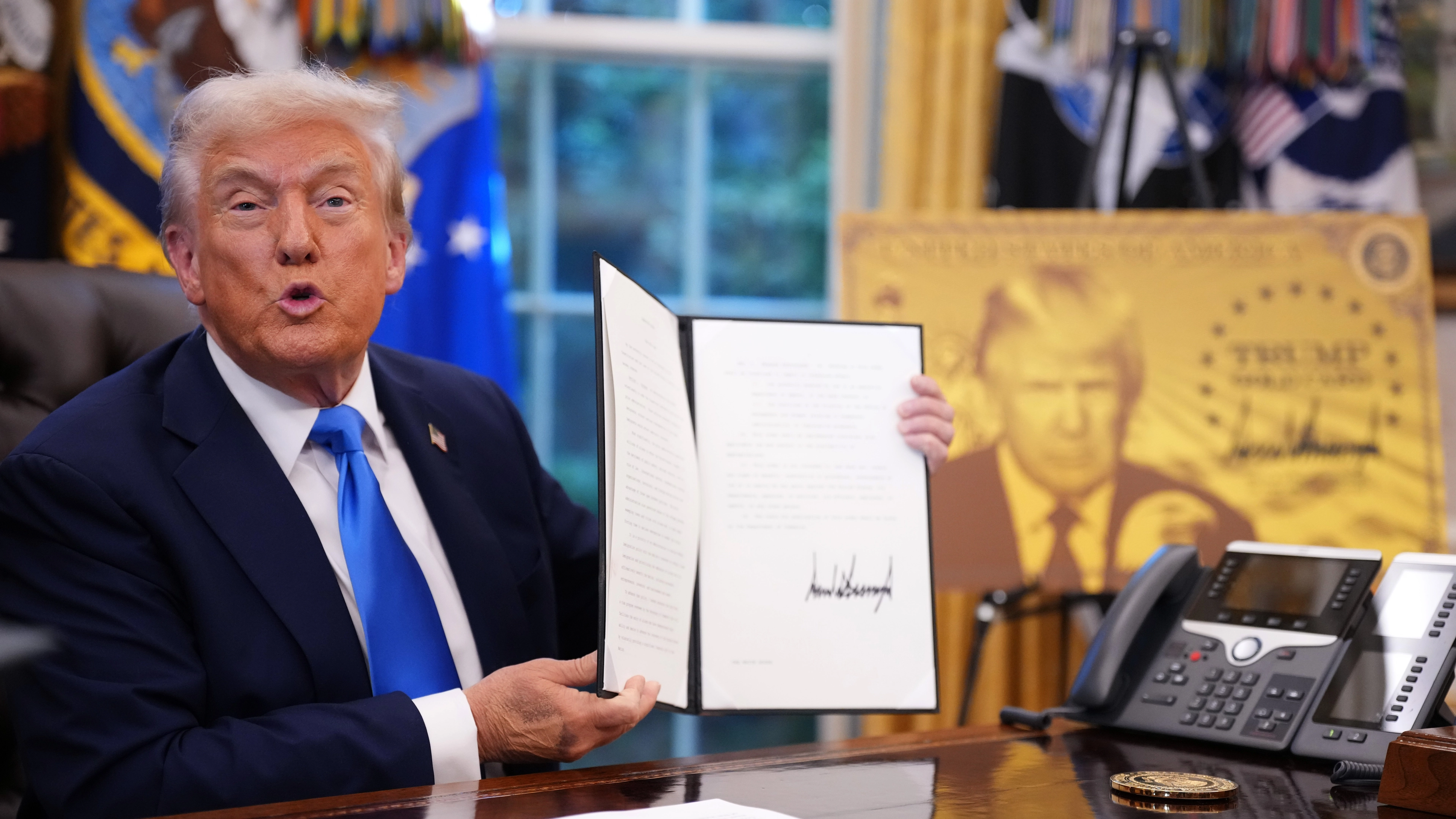Donald Trump reveals new $1million 'gold card' for visas after expanding travel ban to over 30 countries