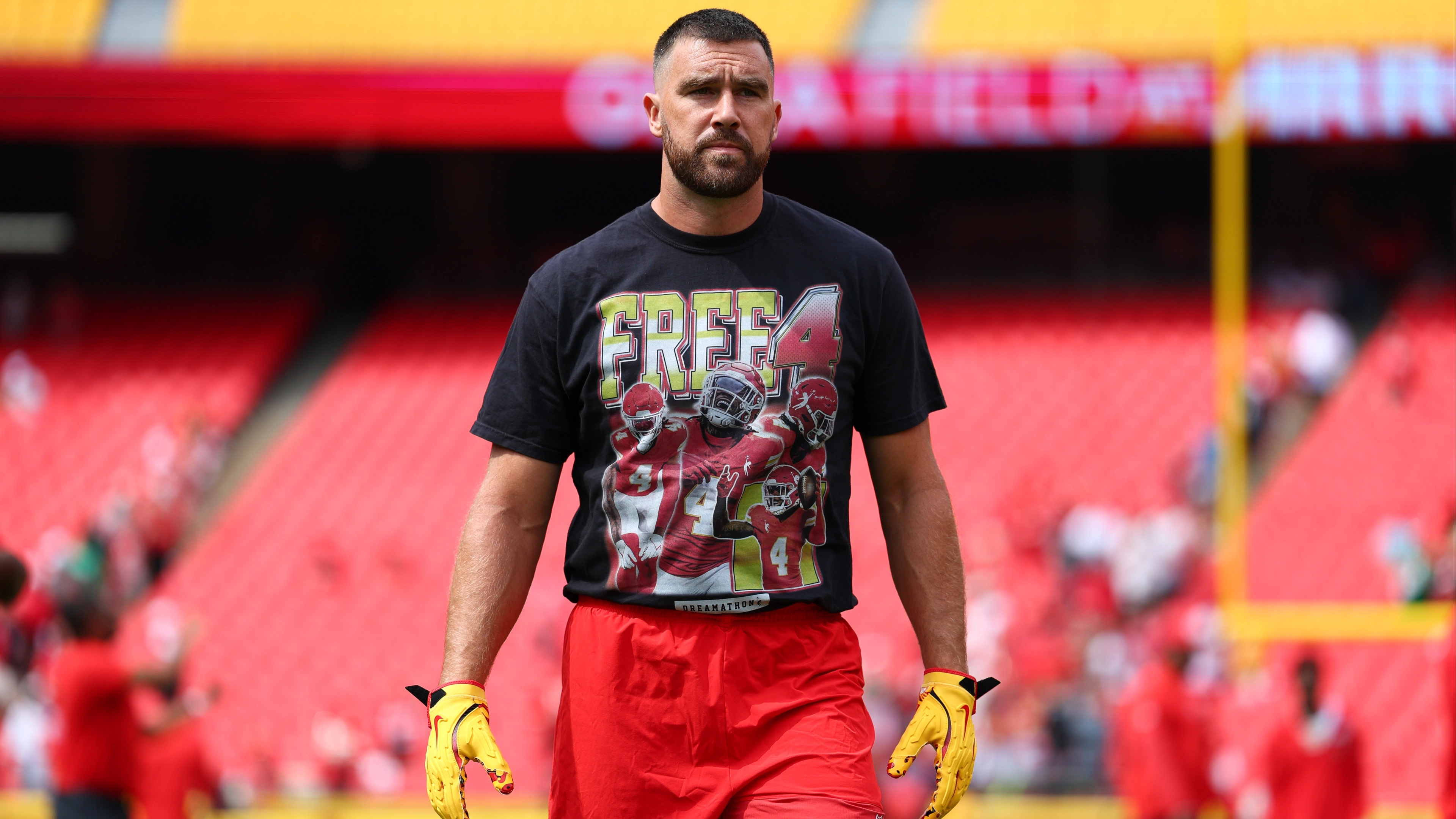Travis Kelce slammed after being spotted wearing 'Free 4' top