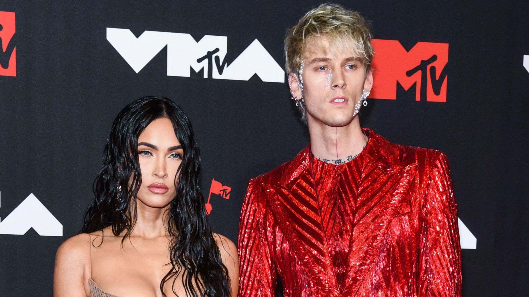 Megan Fox 'Swerves' Machine Gun Kelly's Kiss In Awkward Moment
