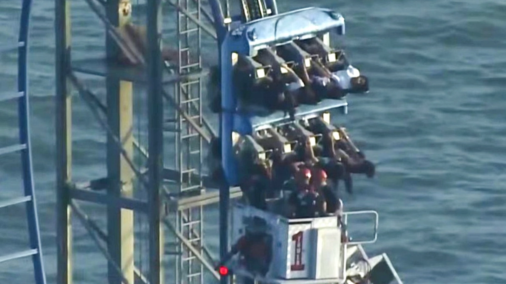 Eight Texas students rescued after being stranded on 100ft-high roller coaster for three hours