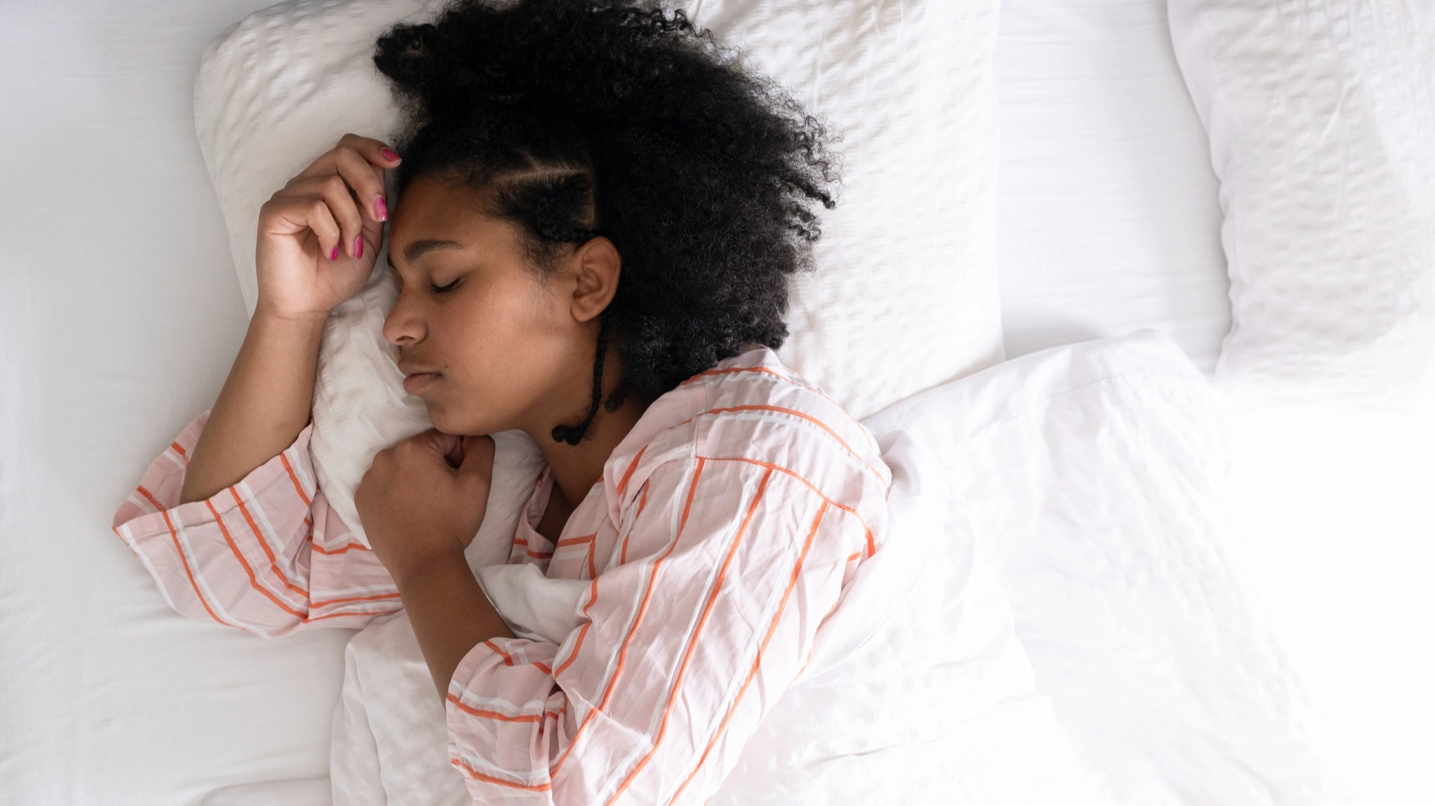 Doctor issues warning to anyone who sleeps in the 'T-Rex position' and claims it could lead to painful condition