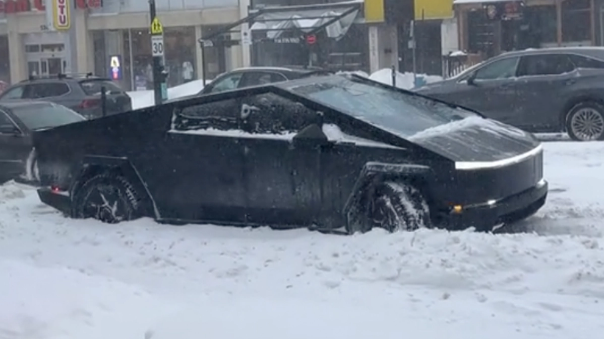 Shocking video shows Tesla Cybertruck struggling to move in heavy snow while other vehicles drive past