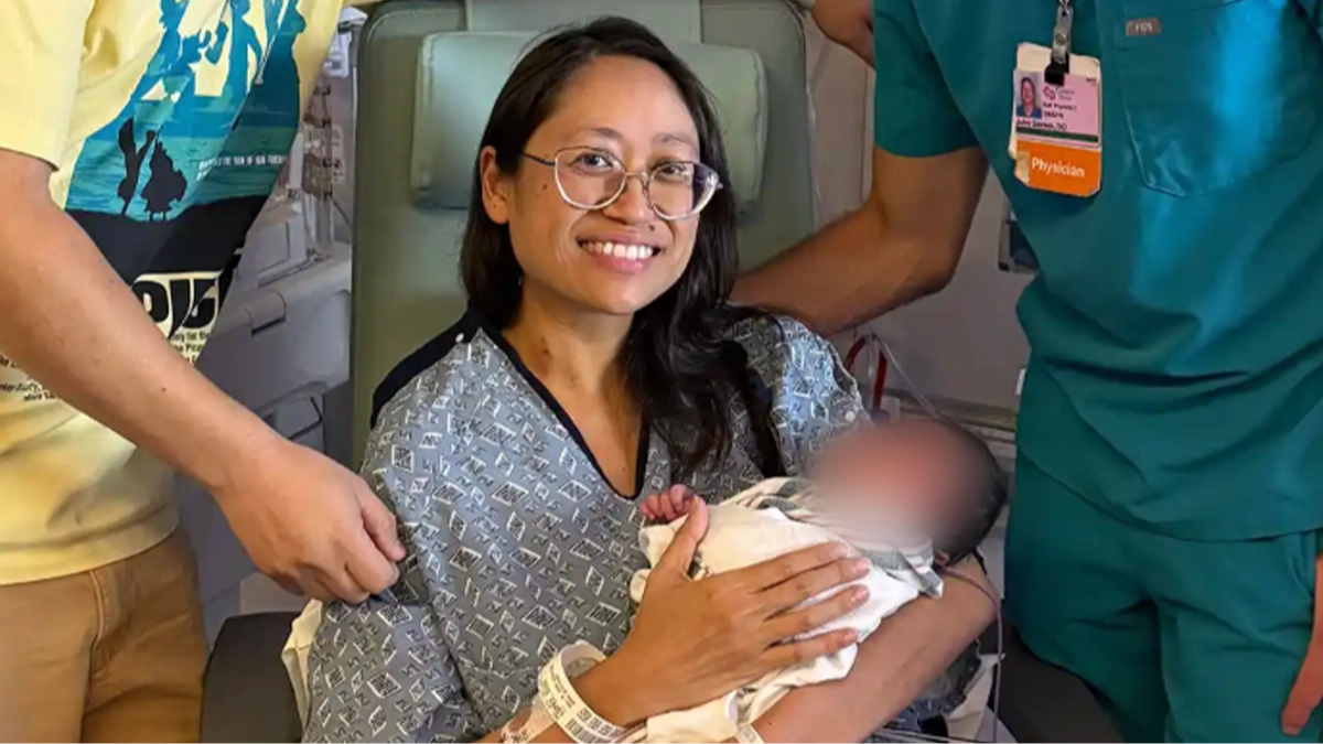 Woman, 41, shocked to discover she had a full-term baby hiding behind 22lb tumor that she was about to have surgery to remove