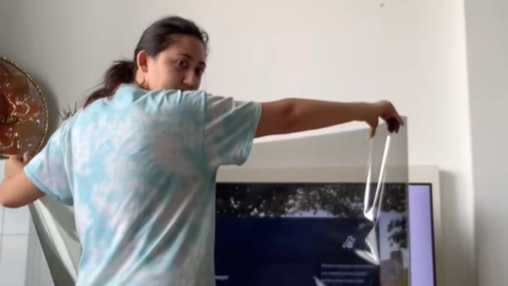 Couple made major mistake as they ripped 'screen' off their new smart TV while filming unboxing