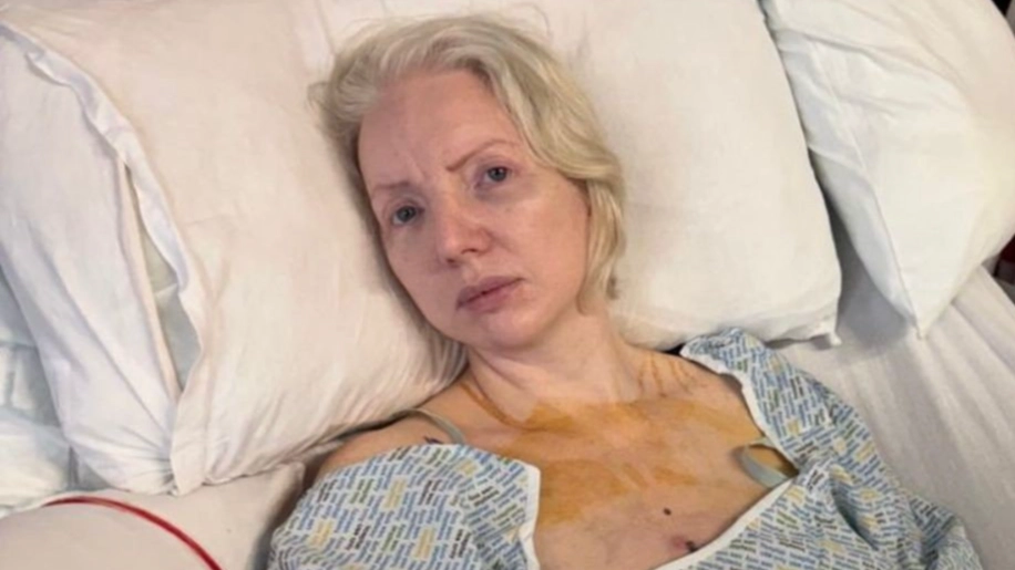 Woman who 'nearly died' says she knew something was wrong after $20k boob job 'started leaking green fluid'