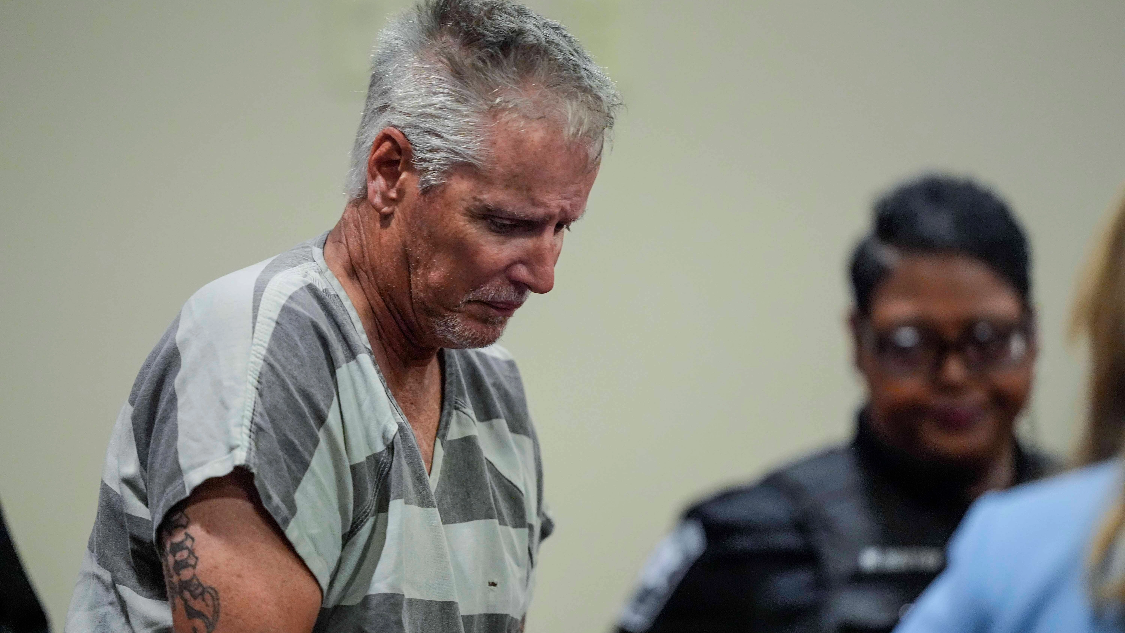 Father of Georgia school shooter found guilty of all charges after his son killed 4 people