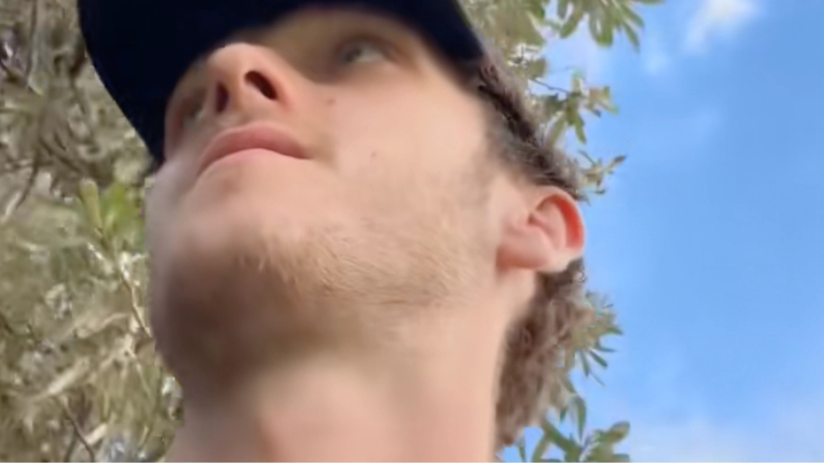 Bondi Beach shooting witness recalls 'stampede' after accidentally capturing gunshots on video