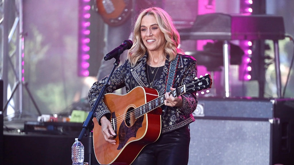 Sheryl Crow explains what would 'really make America great again' as she accuses Trump of labeling her an 'enemy'