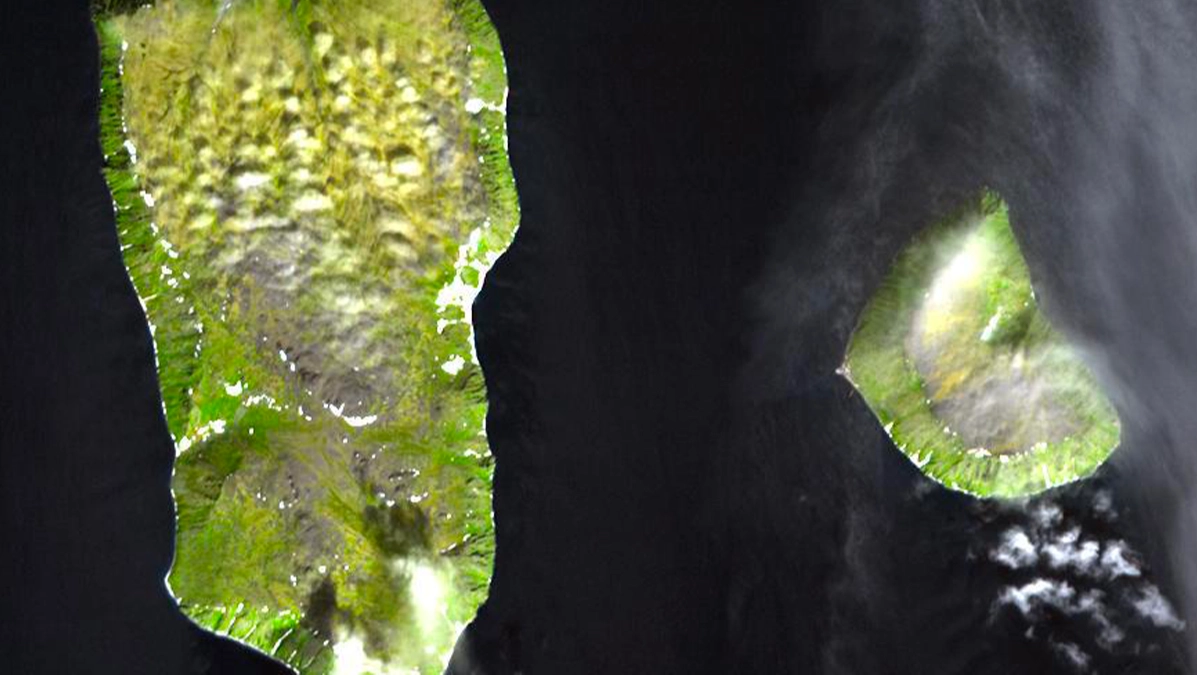Two islands are only three miles apart but are separated by nearly an entire day in time zones