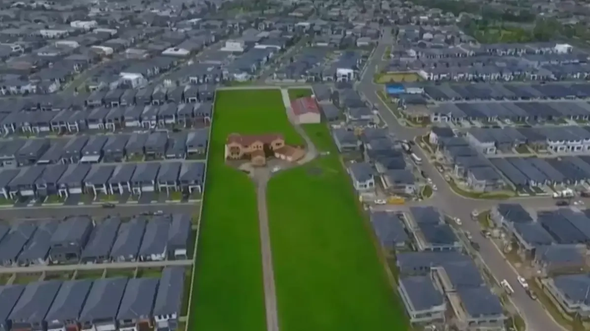 Neighbors of family who turned down $50m from developers who built suburb around their home say they are 'grateful' for their decision