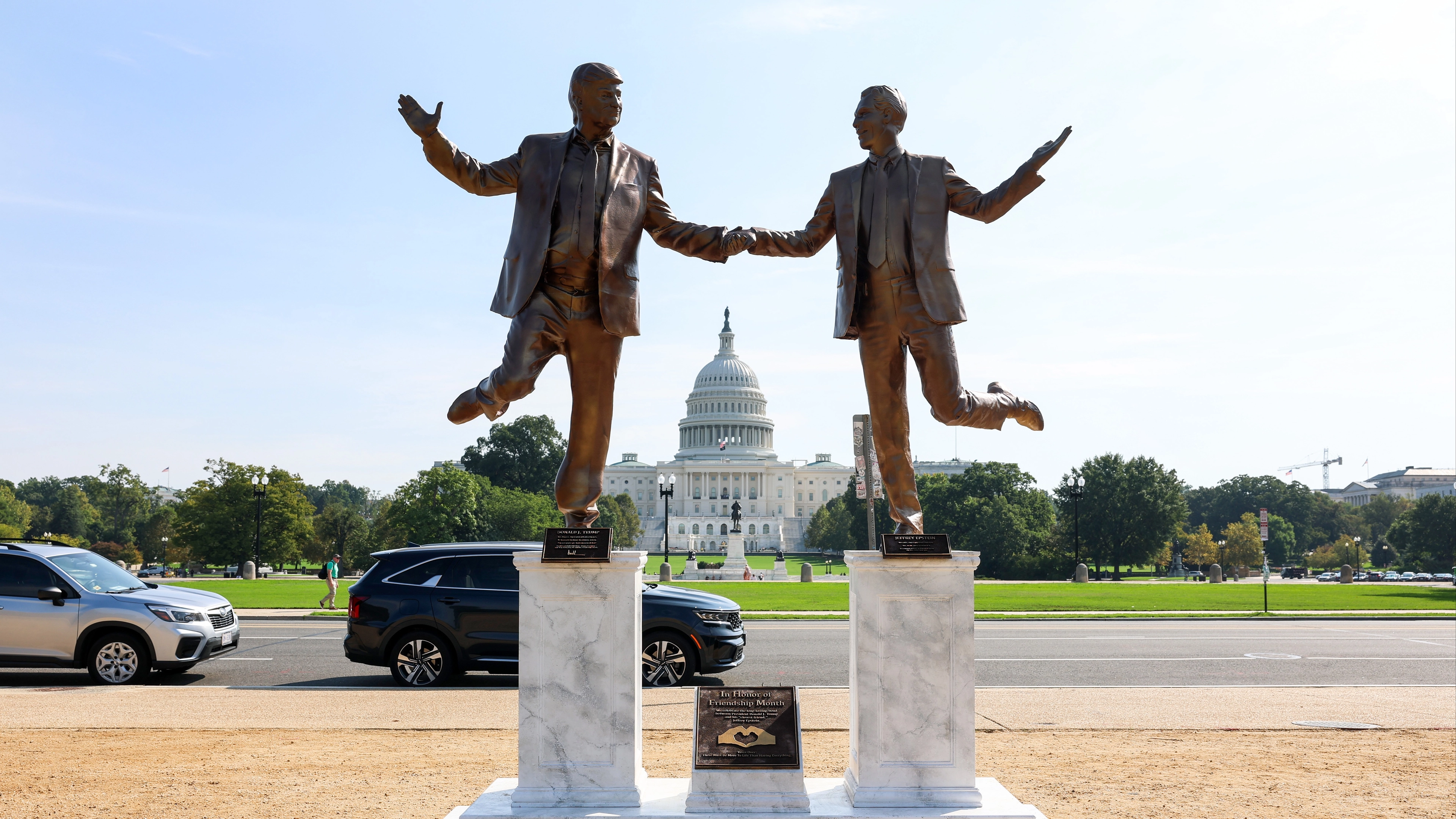Statue of Donald Trump and Jeffrey Epstein holding hands mysteriously appears on DC landmark