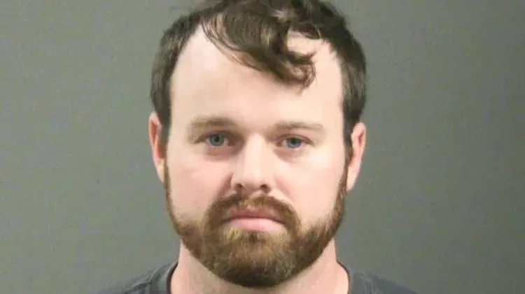 19 Kids and Counting star Joseph Duggar's mugshot released following arrest for alleged child molestation