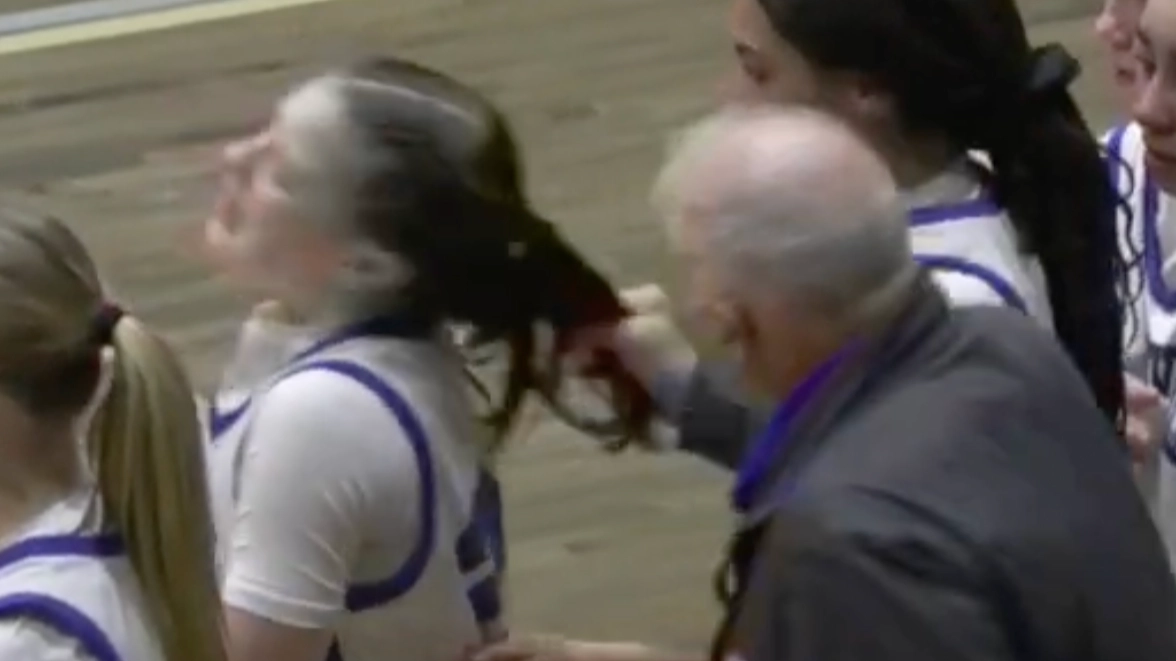 High school basketball coach speaks out after being fired for pulling player’s hair in shocking moment caught on camera