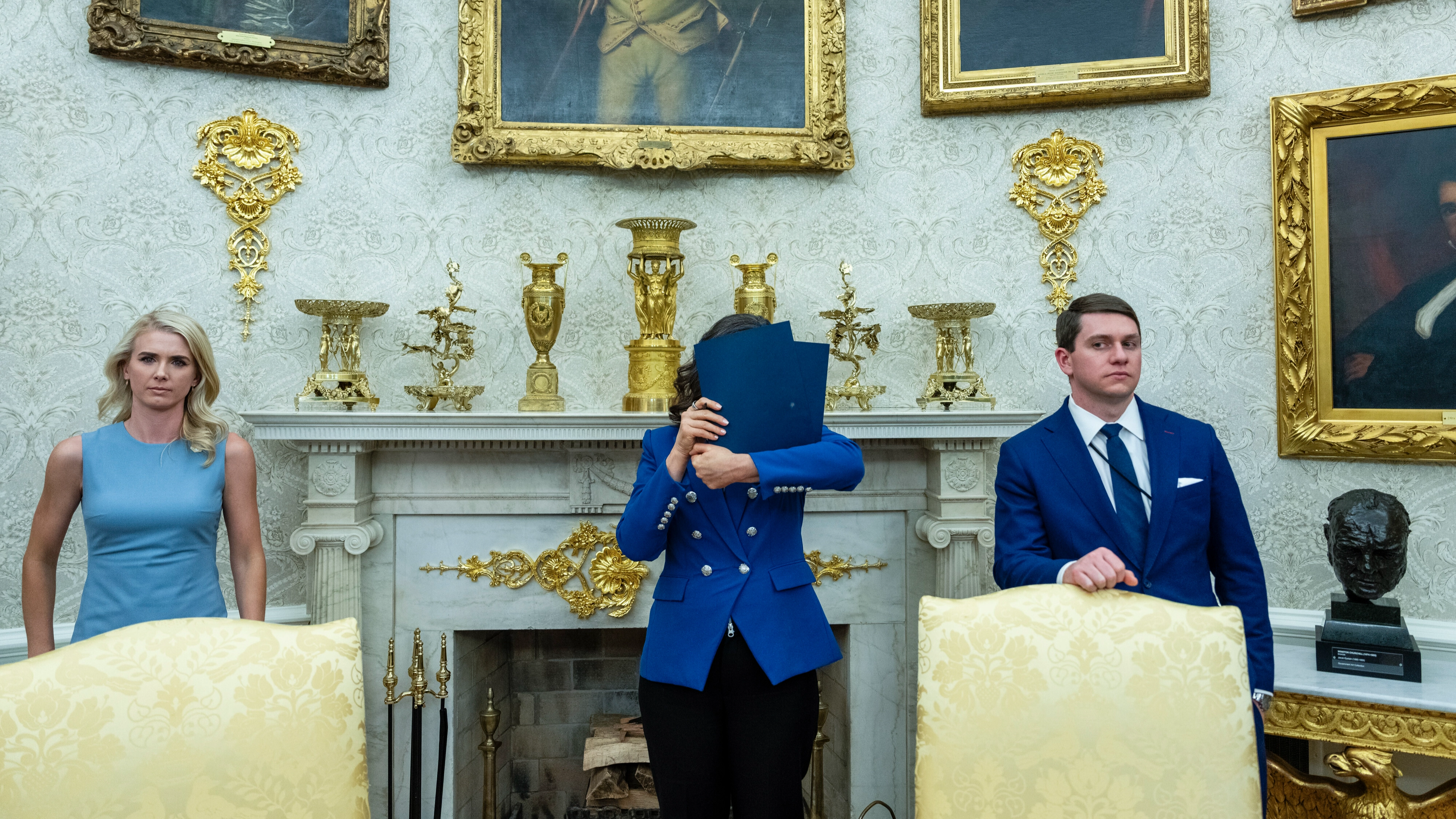 Reason why governor was seen hiding her face in photos taken inside the Oval Office