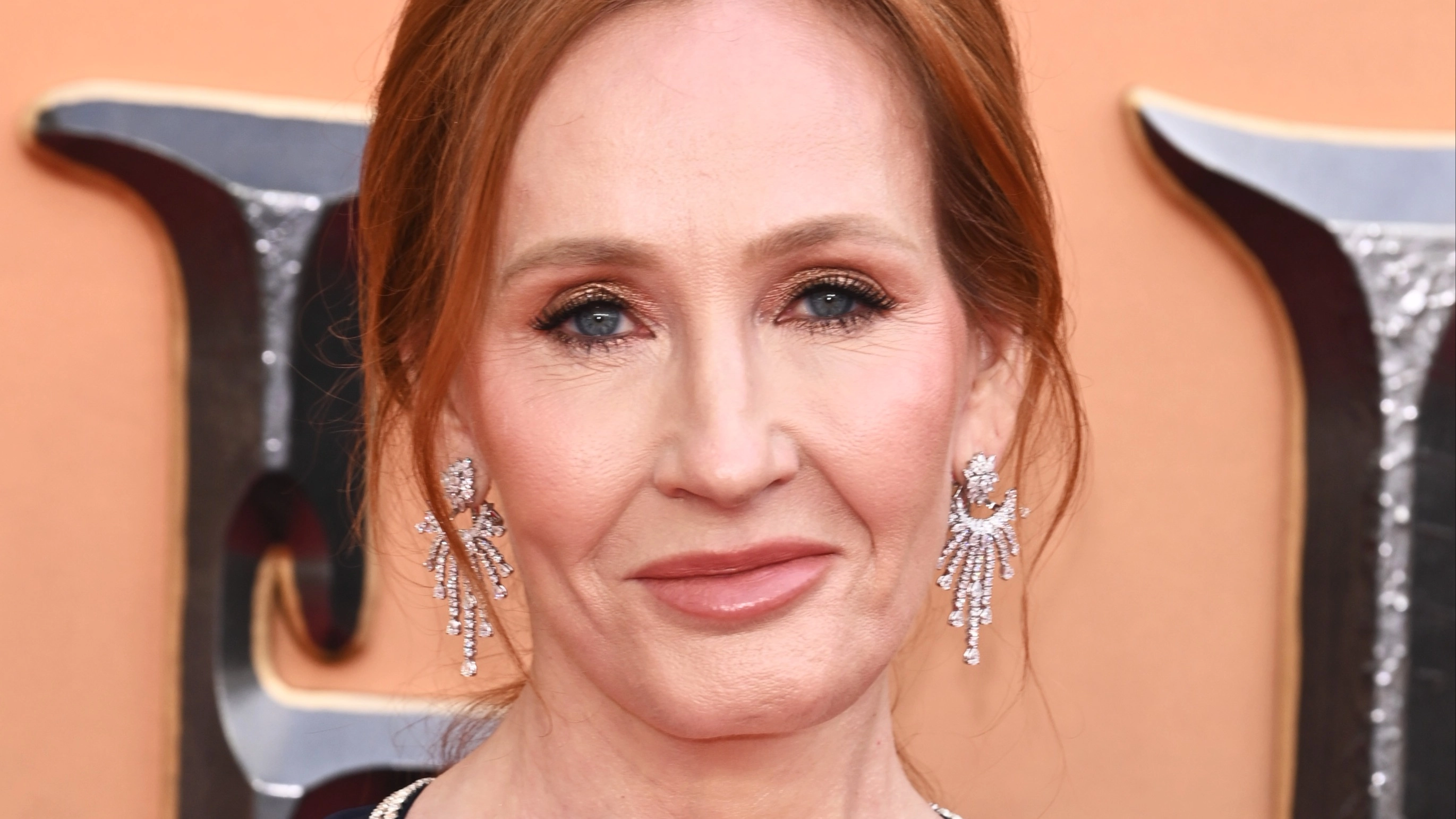 JK Rowling will 'continue to speak out' on trans views despite receiving 'an avalanche of threats'