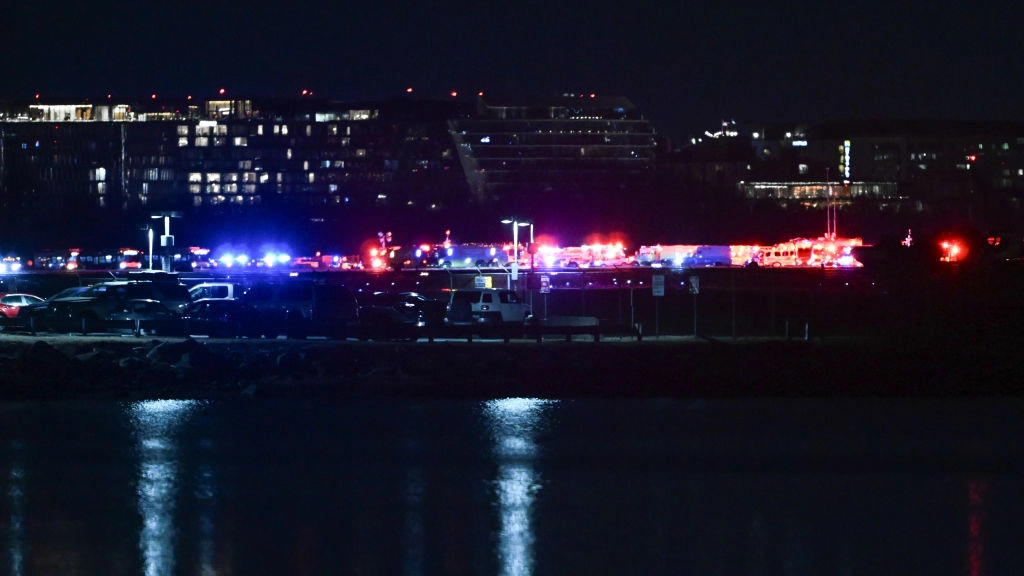 Air traffic control audio describes moments after American Airlines flight collides in mid-air with helicopter