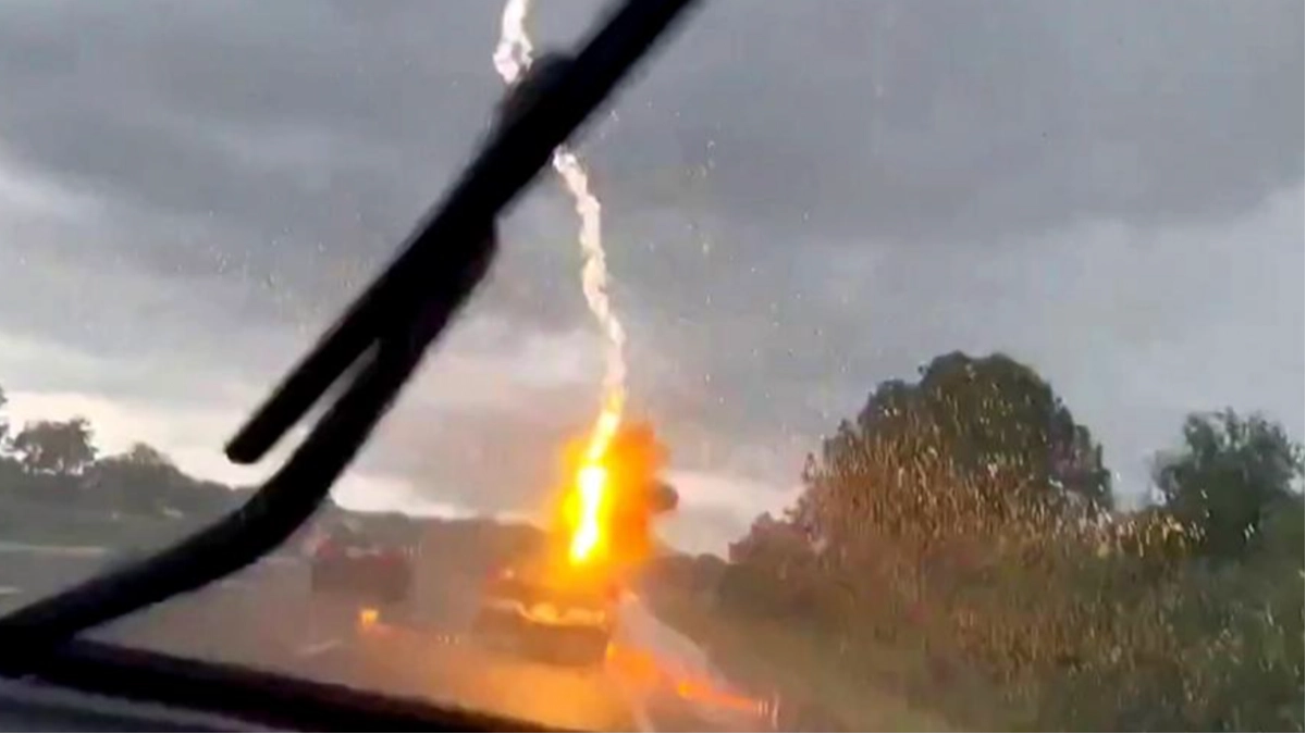 Woman Captures Terrifying Moment Lightning Strikes Her Husband's Truck