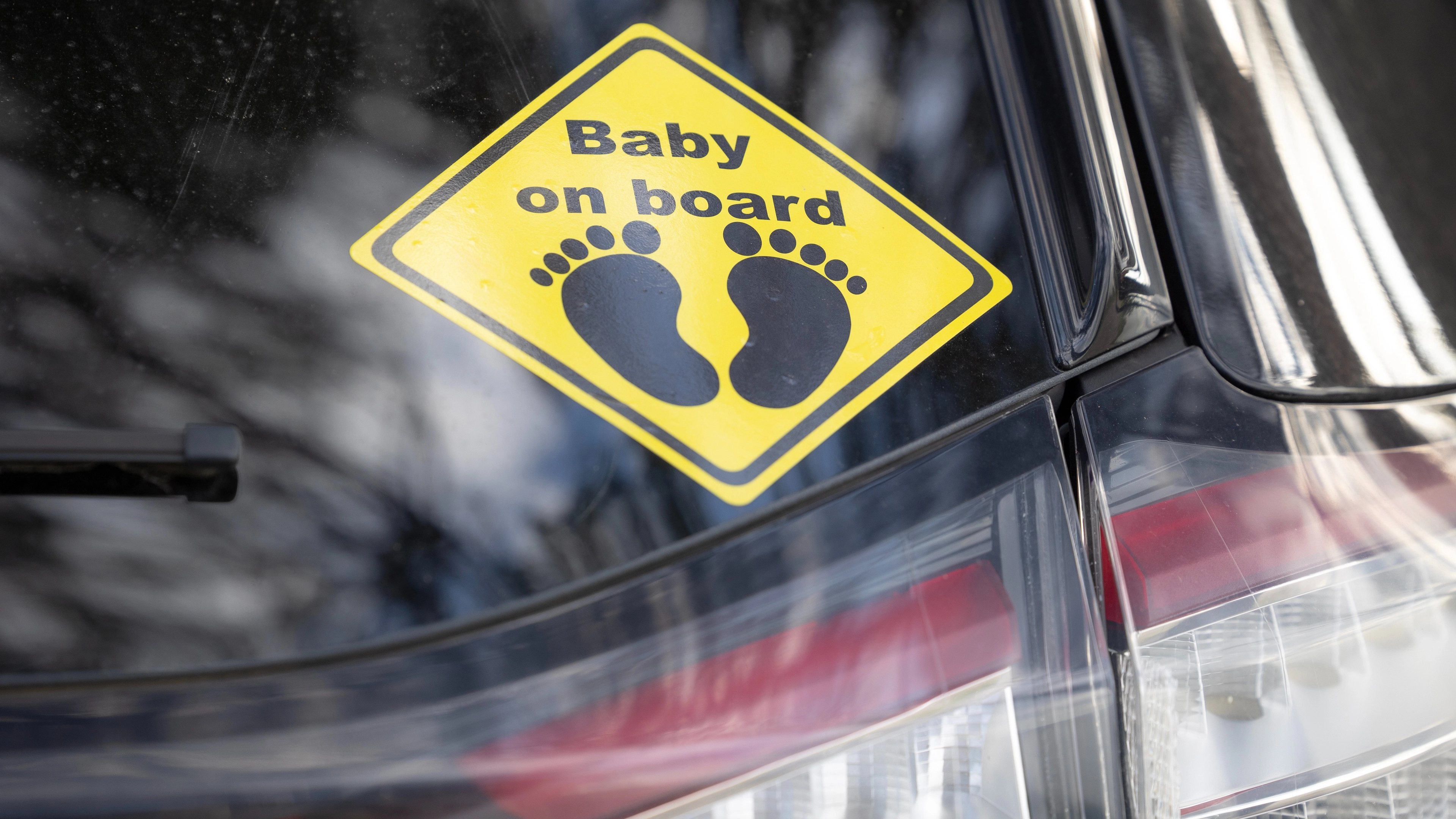 Parents are being warned about the dangers of using 'baby on board' stickers
