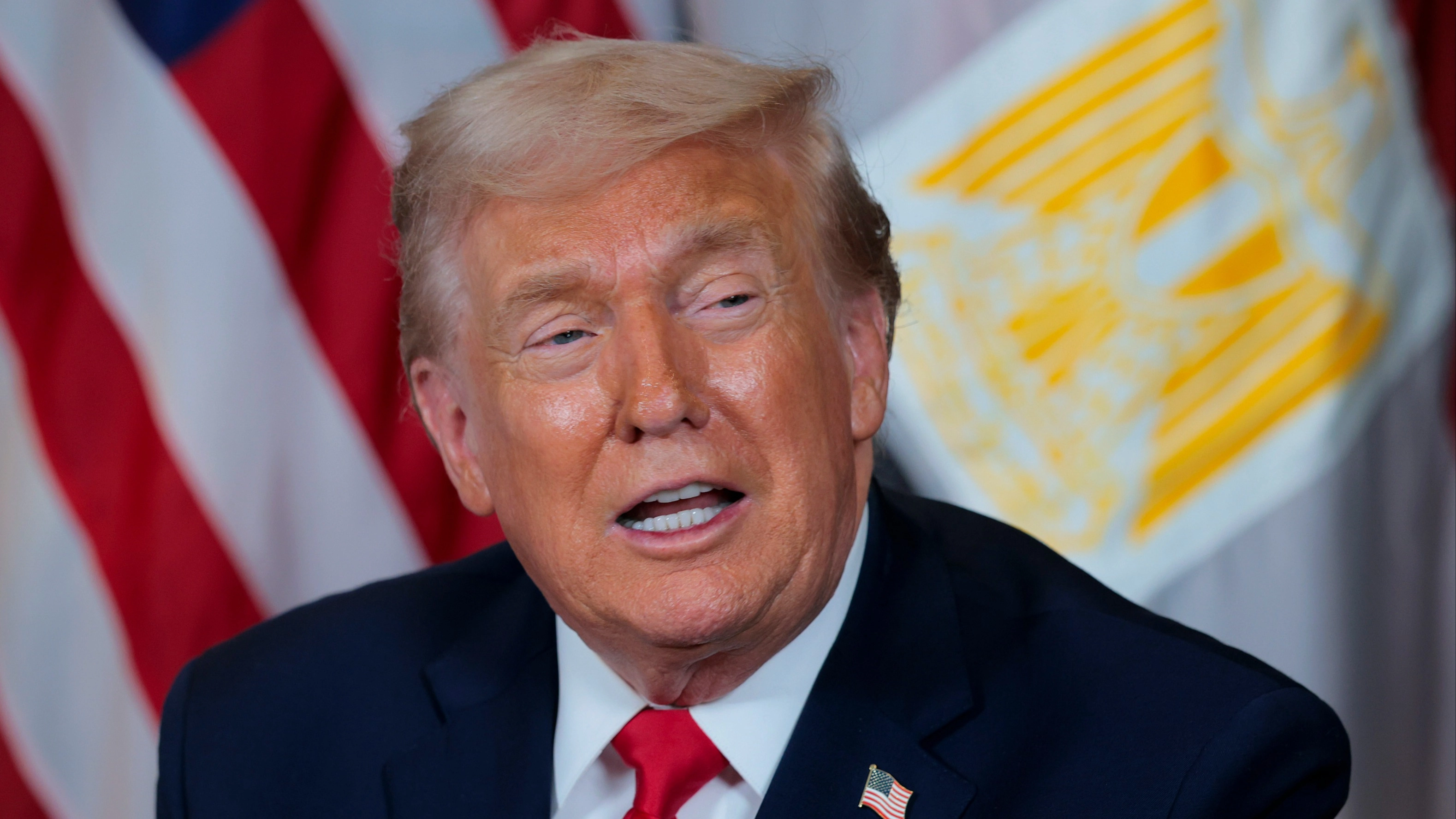 Designs for new US $1 coin with Donald Trump's face revealed as Dems push to block it