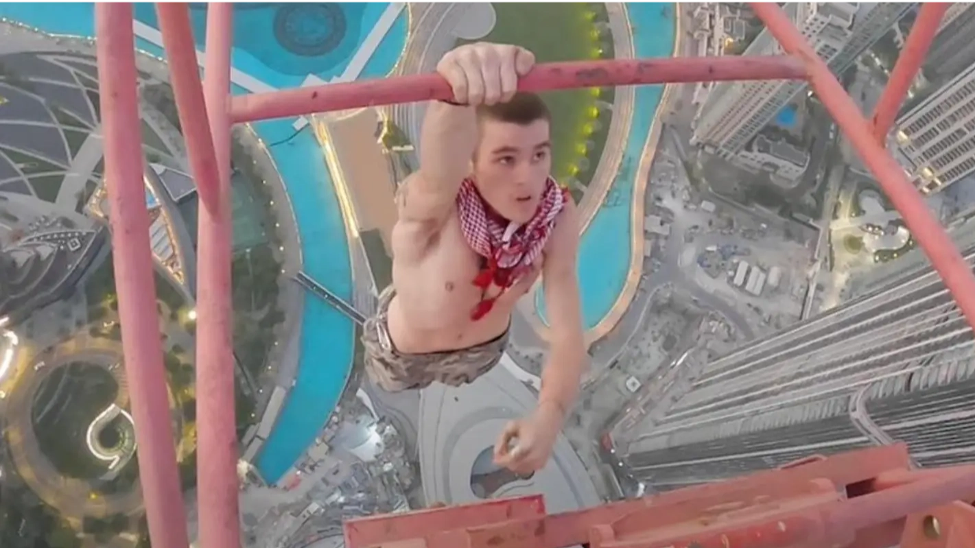 Free climber didn't realise crane had been covered in grease before scaling 1,200ft above Dubai