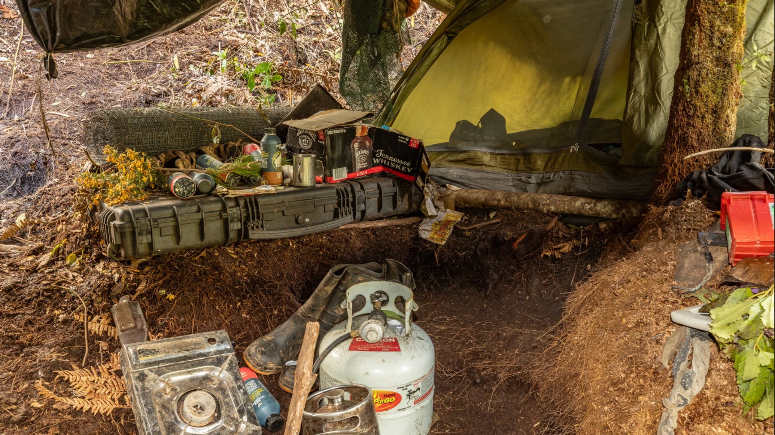 Photos of 'grim' campsite where dad and three kids lived before he was shot dead show worrying truth