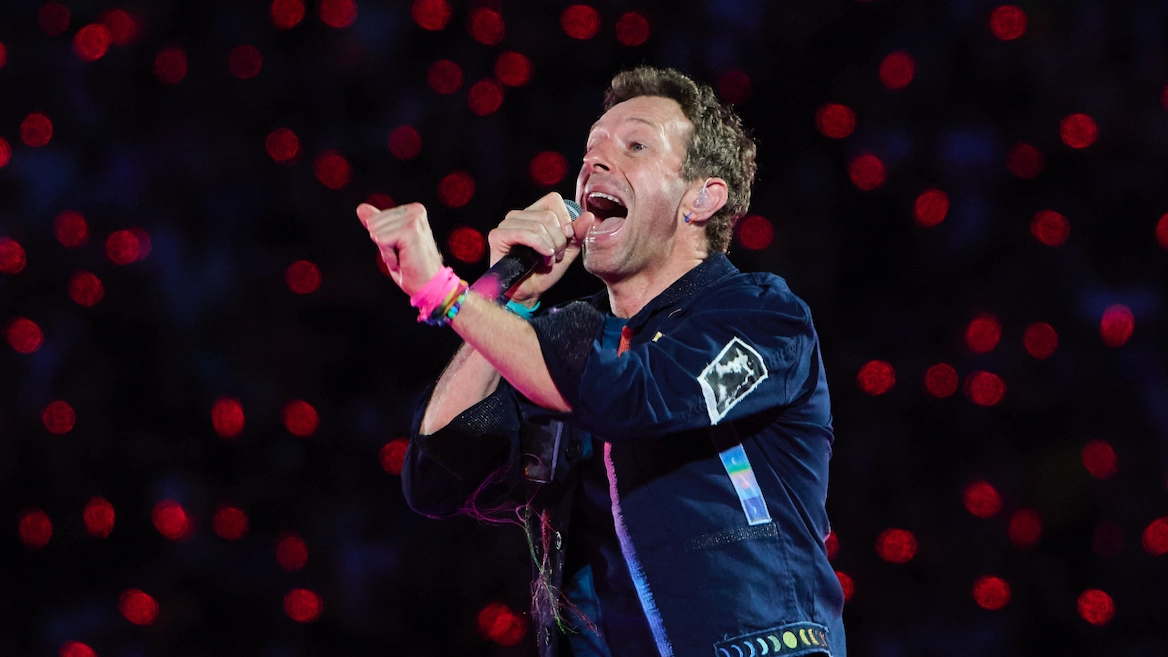 Chris Martin breaks silence in first concert since CEO kiss cam incident with warning to fans