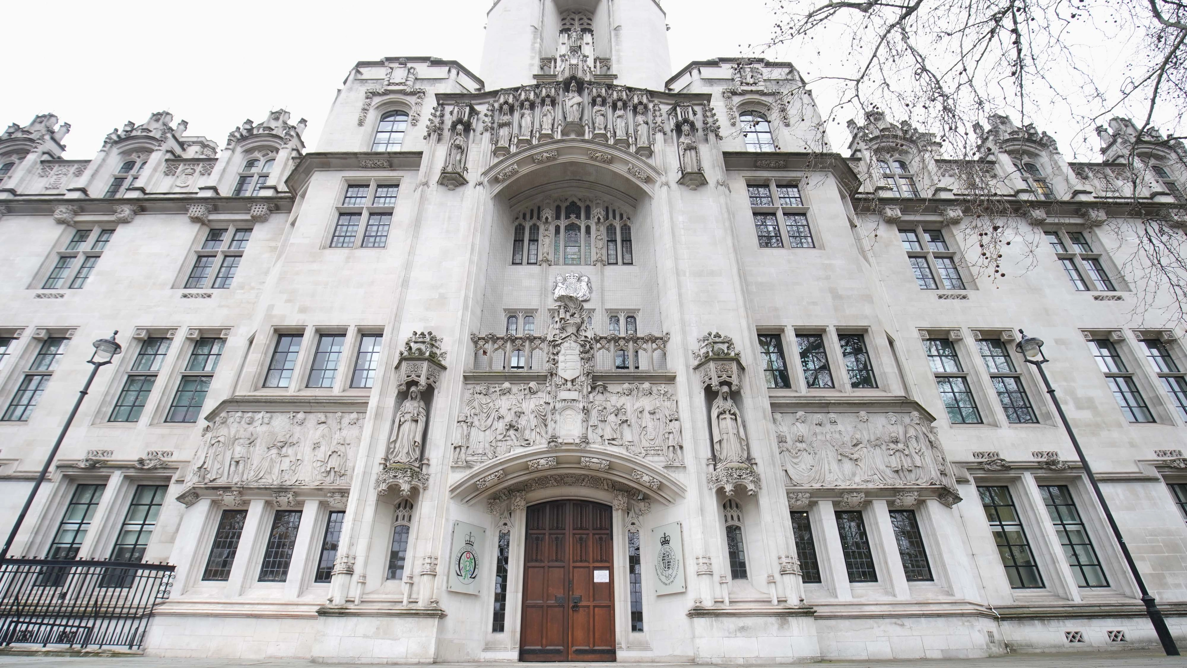 Legal definition of a woman is based on biological sex, UK supreme court rules