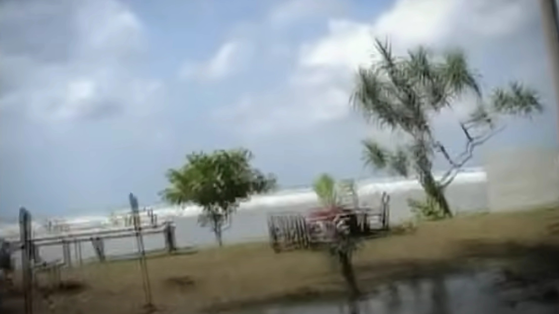'Unseen footage' of deadly tsunami that killed 220,000 shows moment of impact before huge devastation