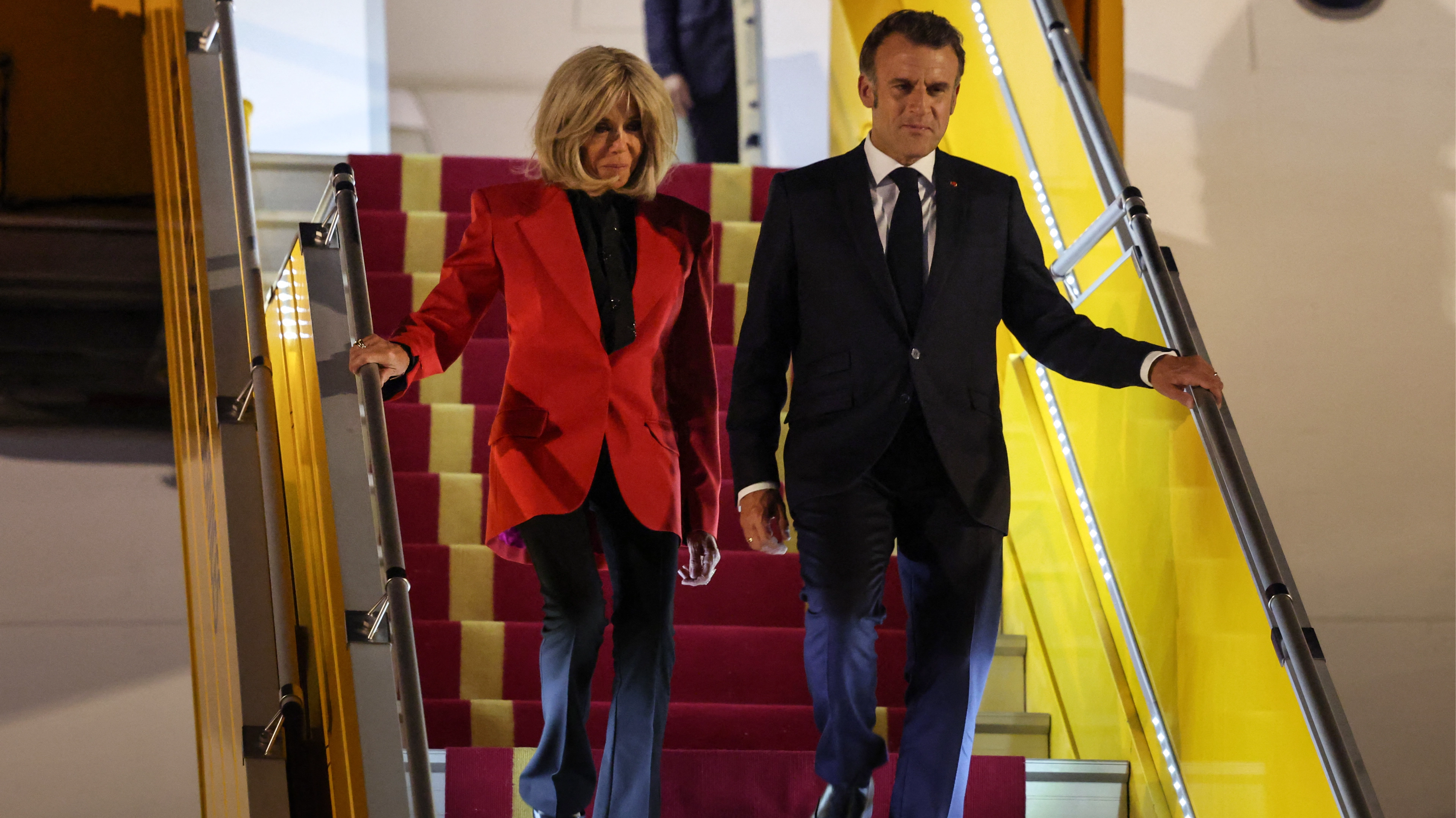 Lip reader 'reveals' what French President Macron's wife said moments after 'slapping him in face' in heated exchange