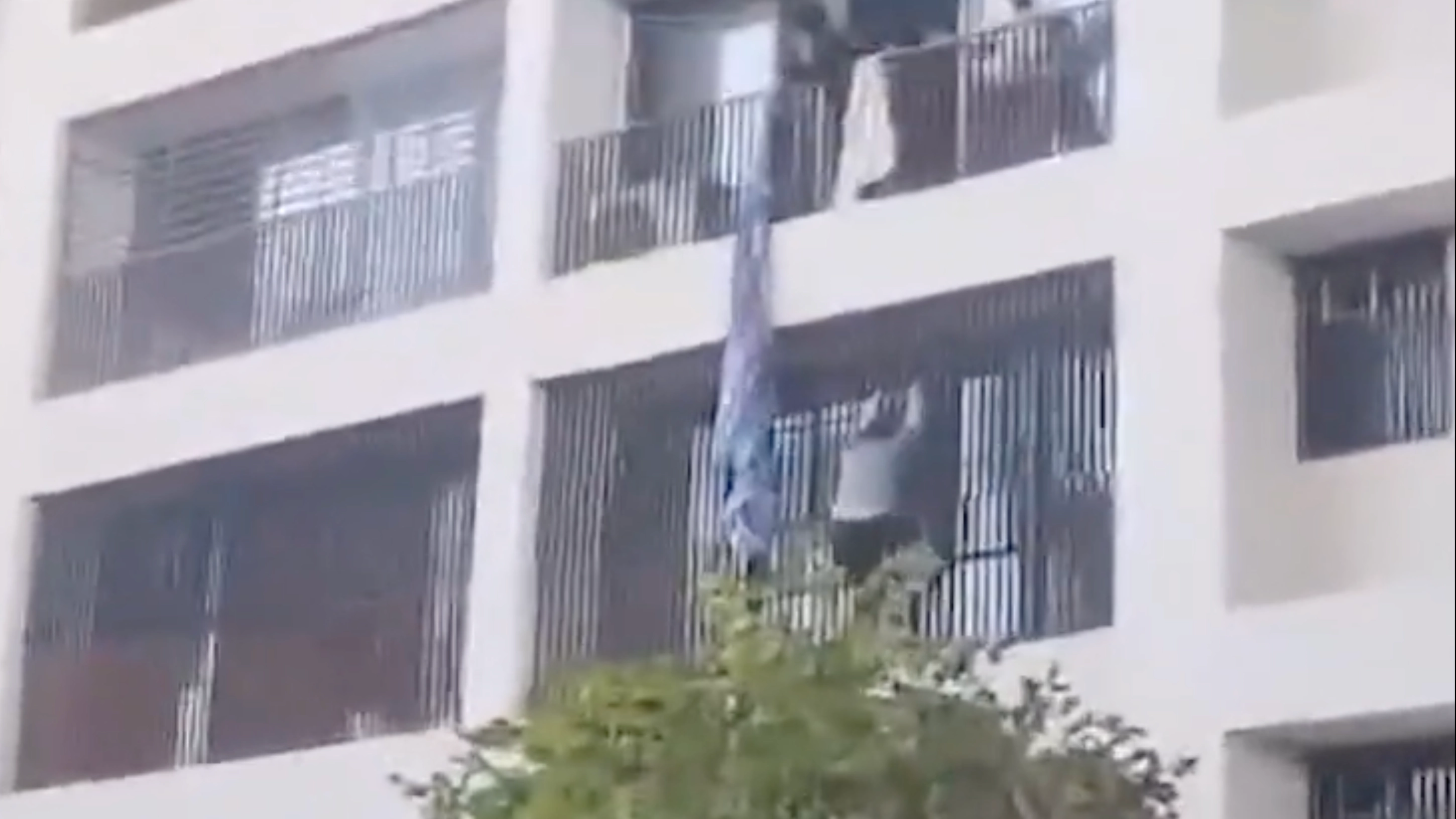Gut-wrenching video shows moment students dangle from balcony to escape Air India crash