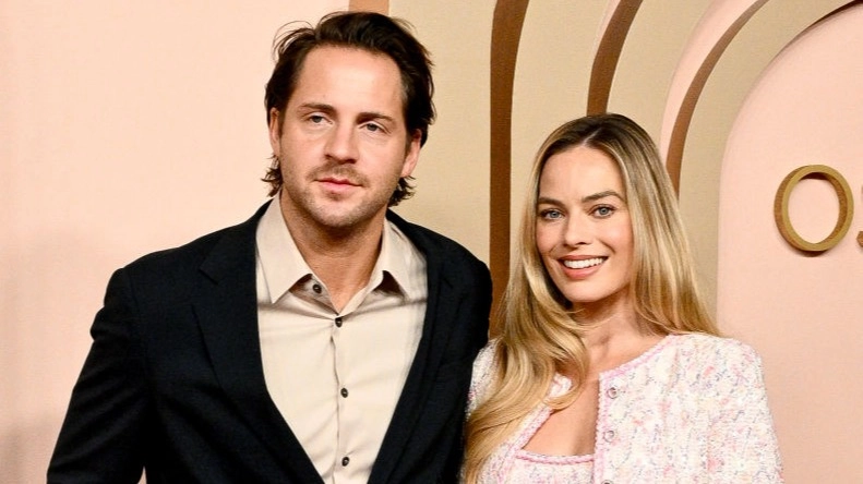 Margot Robbie reveals new name a decade after marrying husband