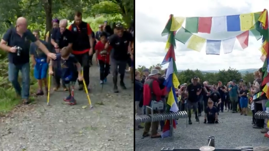 Eight-year-old boy with prosthetic legs climbs Lakeland fell after raising £19,000 for charity