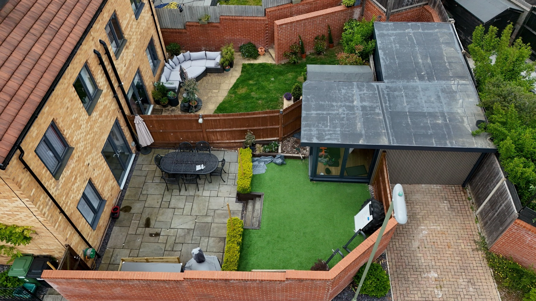 Residents get revenge on neighbour who built massive home gym on their drive