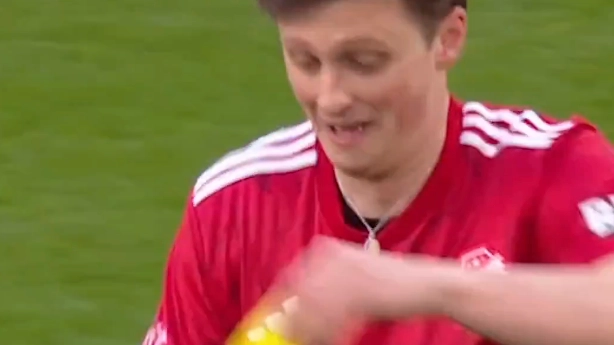 Player pulls out shredder after being given a yellow card by referee mid-football match