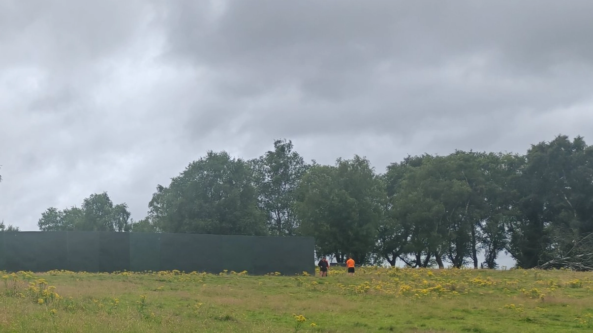 Oasis fans furious after huge fence put up on ‘Gallagher Hill’ blocking viral view of stage